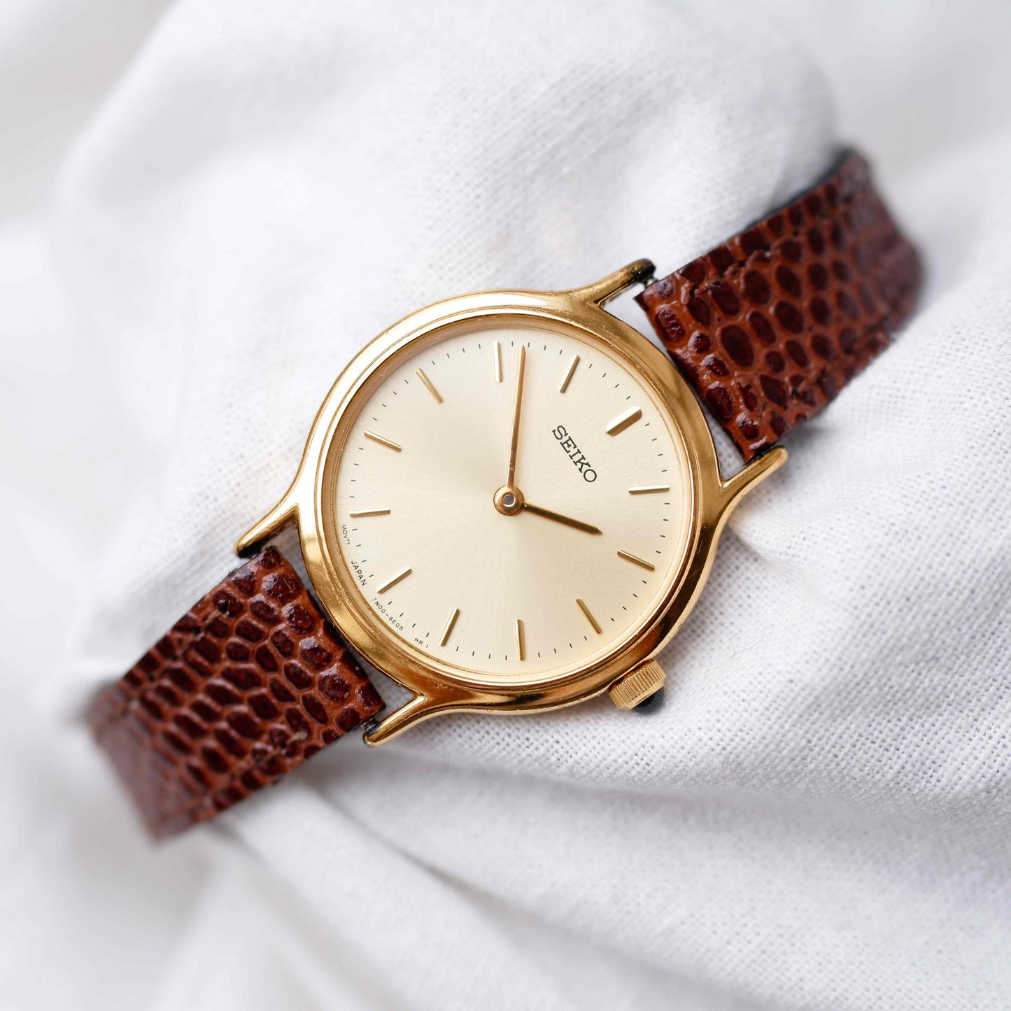 Seiko Vintage Watch: Ladies 80s Gold with Sunburst Champagne Dial
