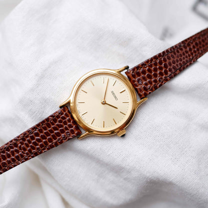 Seiko Vintage Watch: Ladies 80s Gold with Sunburst Champagne Dial