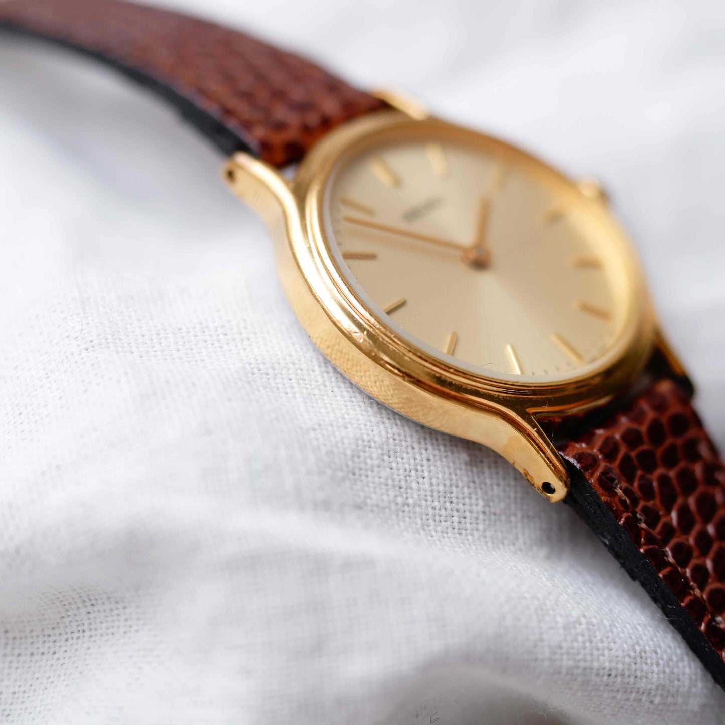 Seiko Vintage Watch: Ladies 80s Gold with Sunburst Champagne Dial