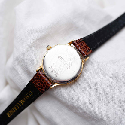 Seiko Vintage Watch: Ladies 80s Gold with Sunburst Champagne Dial
