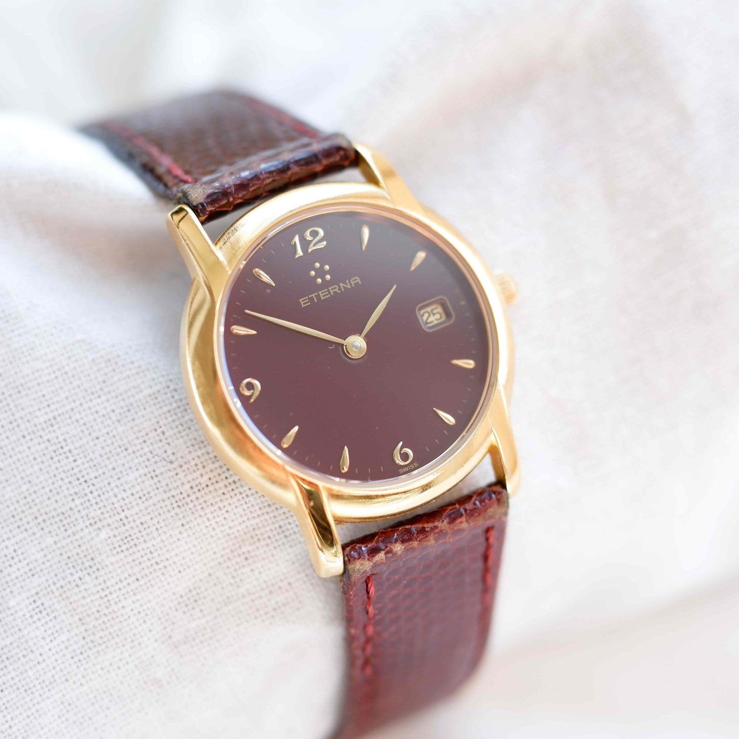 Eterna Vintage Watch: Ladies 90s Gold with Burgundy Colored Dial