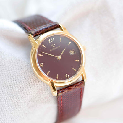 Eterna Vintage Watch: Ladies 90s Gold with Burgundy Colored Dial