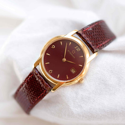 Eterna Vintage Watch: Ladies 90s Gold with Burgundy Colored Dial
