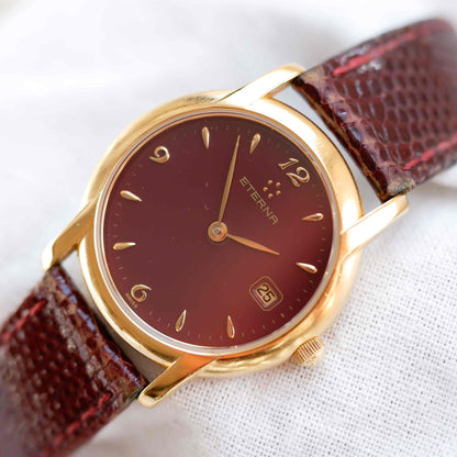 Eterna Vintage Watch: Ladies 90s Gold with Burgundy Colored Dial