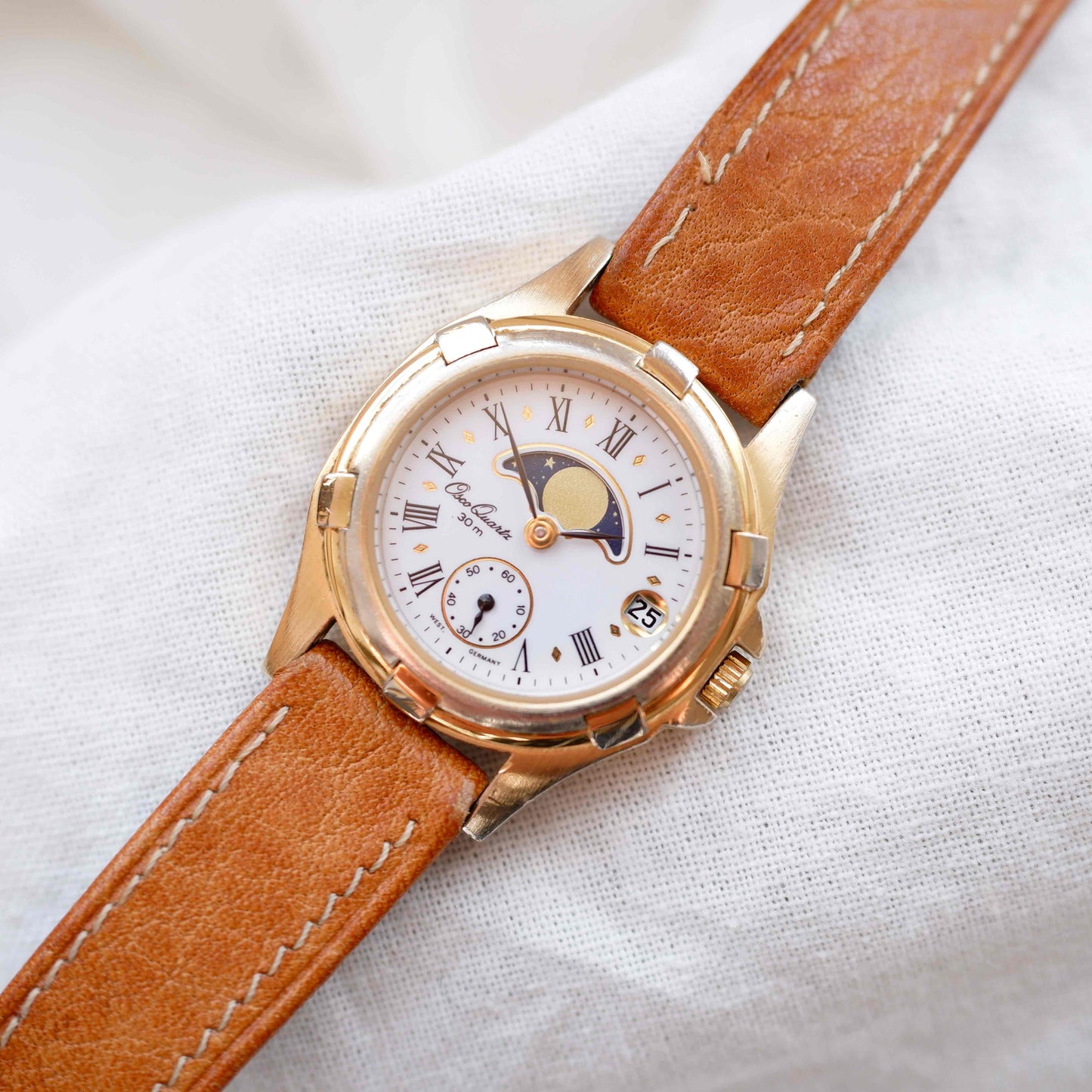 Osco Moon Phase Watch: Ladies 90s Gold with Roman Numerals Blue White Dial