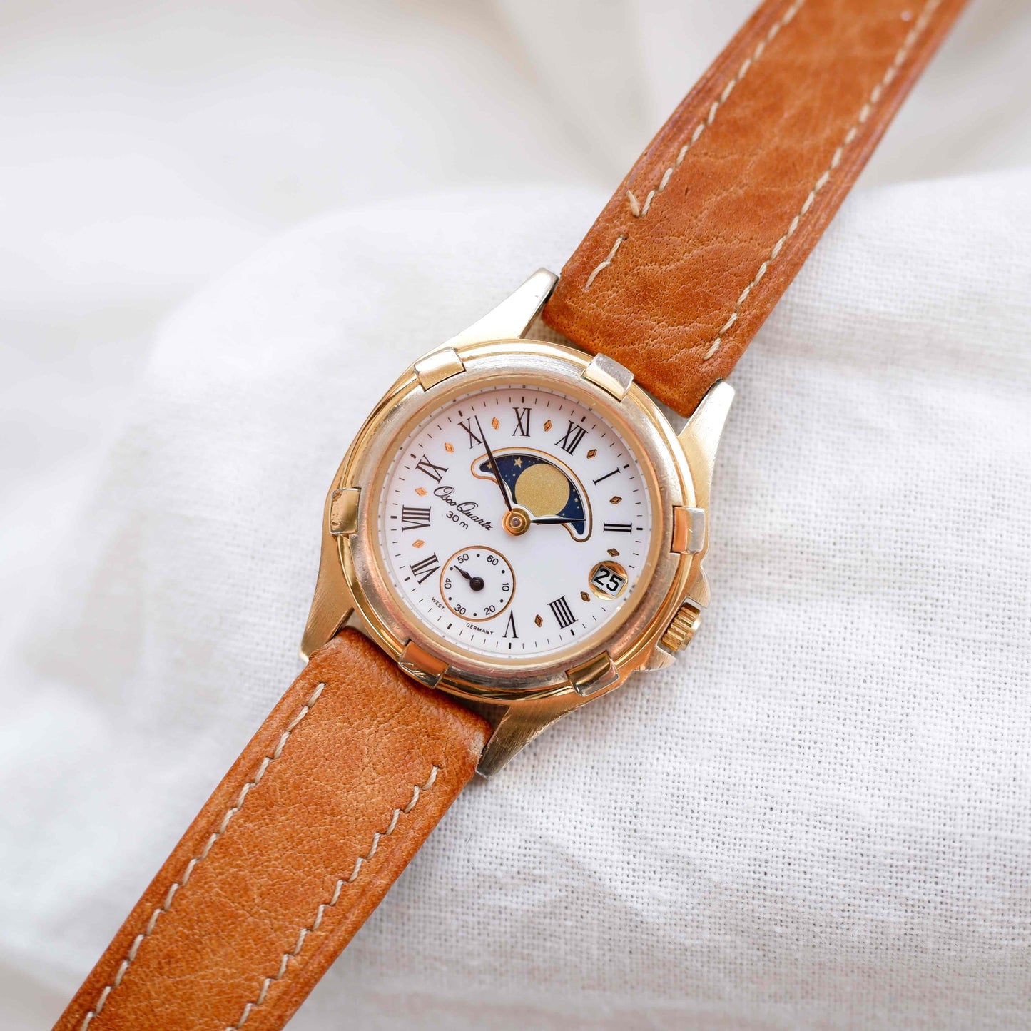 Osco Moon Phase Watch: Ladies 90s Gold with Roman Numerals Blue White Dial