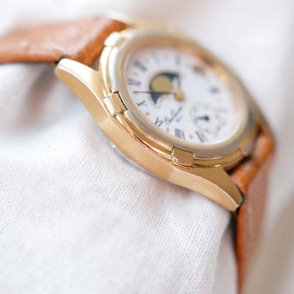Osco Moon Phase Watch: Ladies 90s Gold with Roman Numerals Blue White Dial