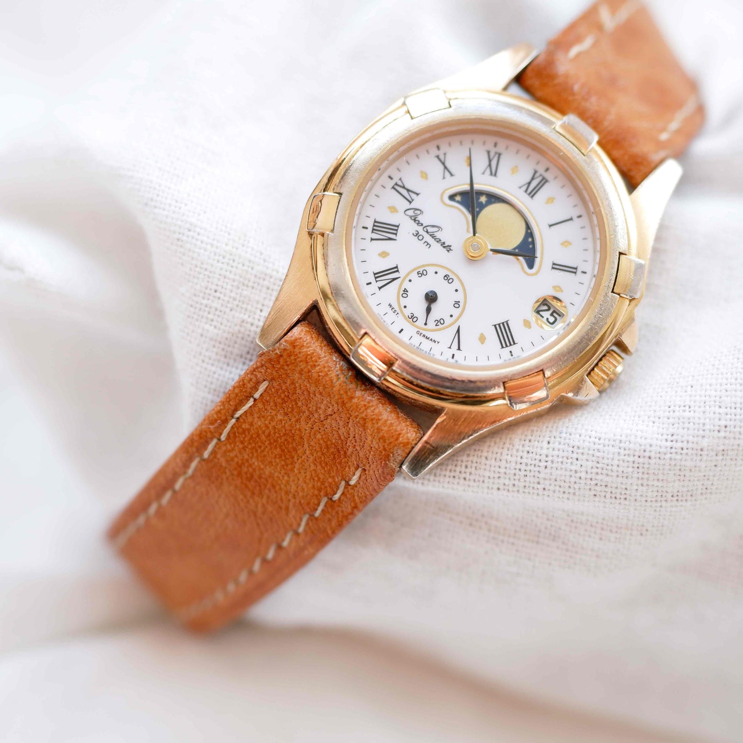 Osco Moon Phase Watch: Ladies 90s Gold with Roman Numerals Blue White Dial