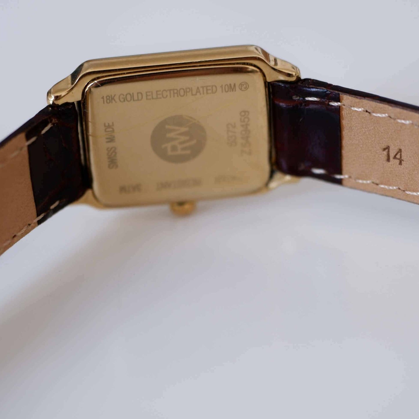 Raymond Weil Vintage Ladies Watch: 90s Golden Rectangular Style with White Dial | Back Side
