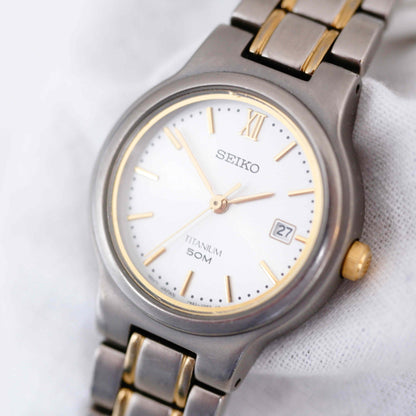 Seiko Vintage Watch: Ladies 90s Gold Titanium Diver with Classic Silver Dial