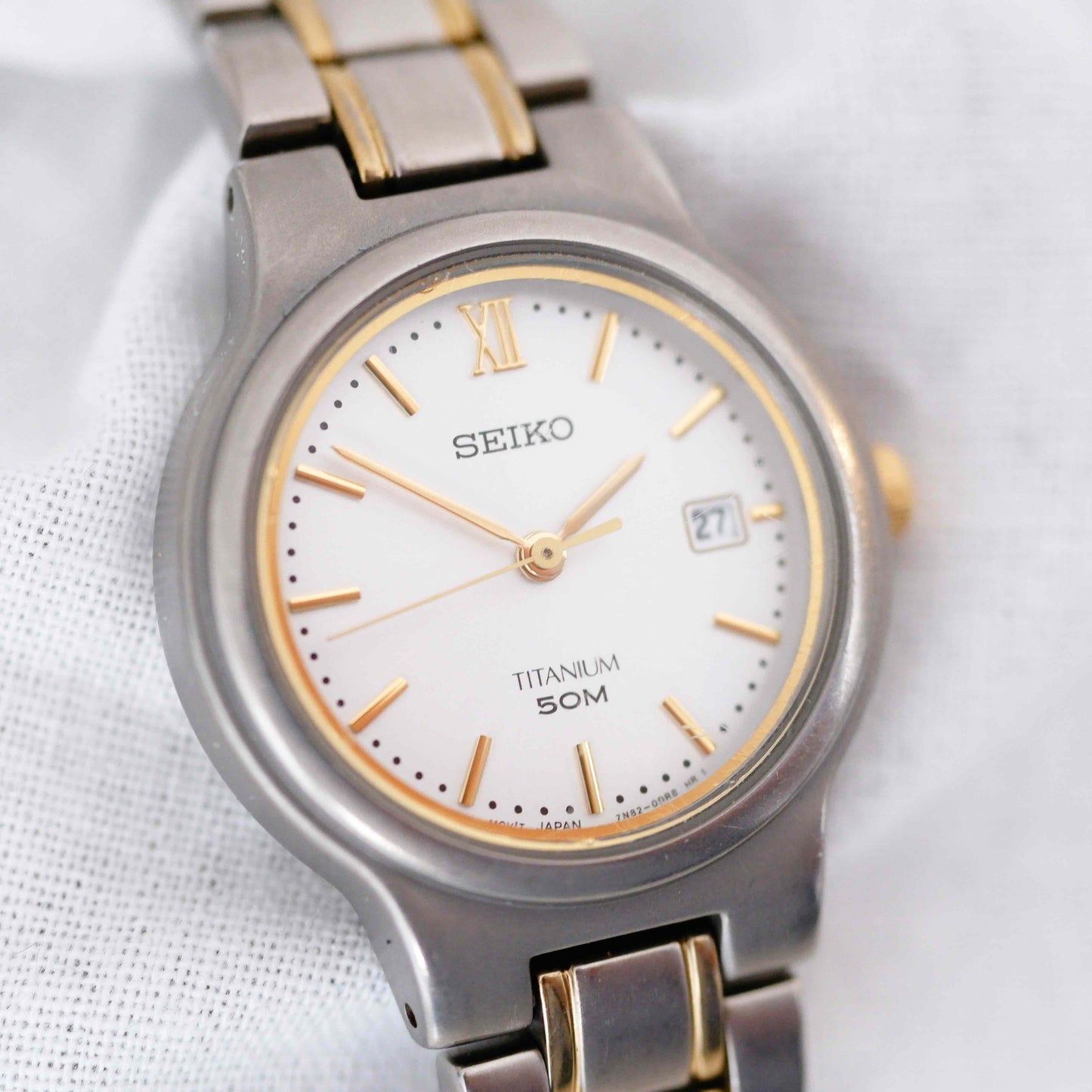 Seiko Vintage Watch: Ladies 90s Gold Titanium Diver with Classic Silver Dial