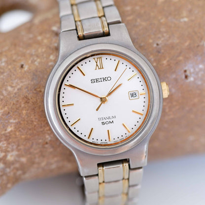 Seiko Vintage Ladies Watch: 90s Gold Titan Diver with Classic Silver Dial | Slight Left Side