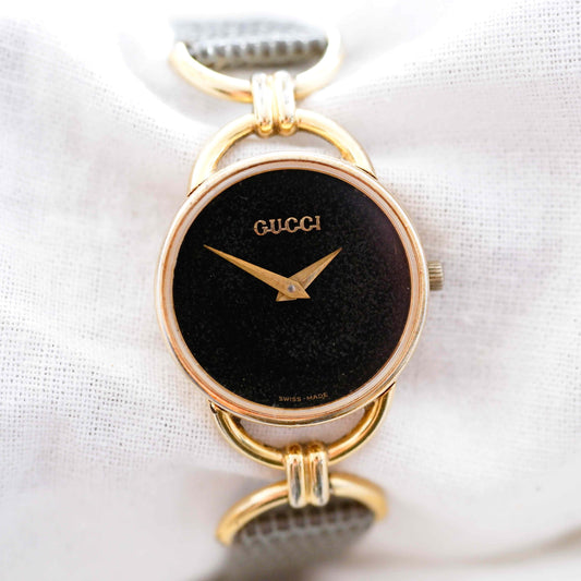 Gucci 6000.2.l Watch: Vintage Ladies 90s Gold and Tropical Black Dial