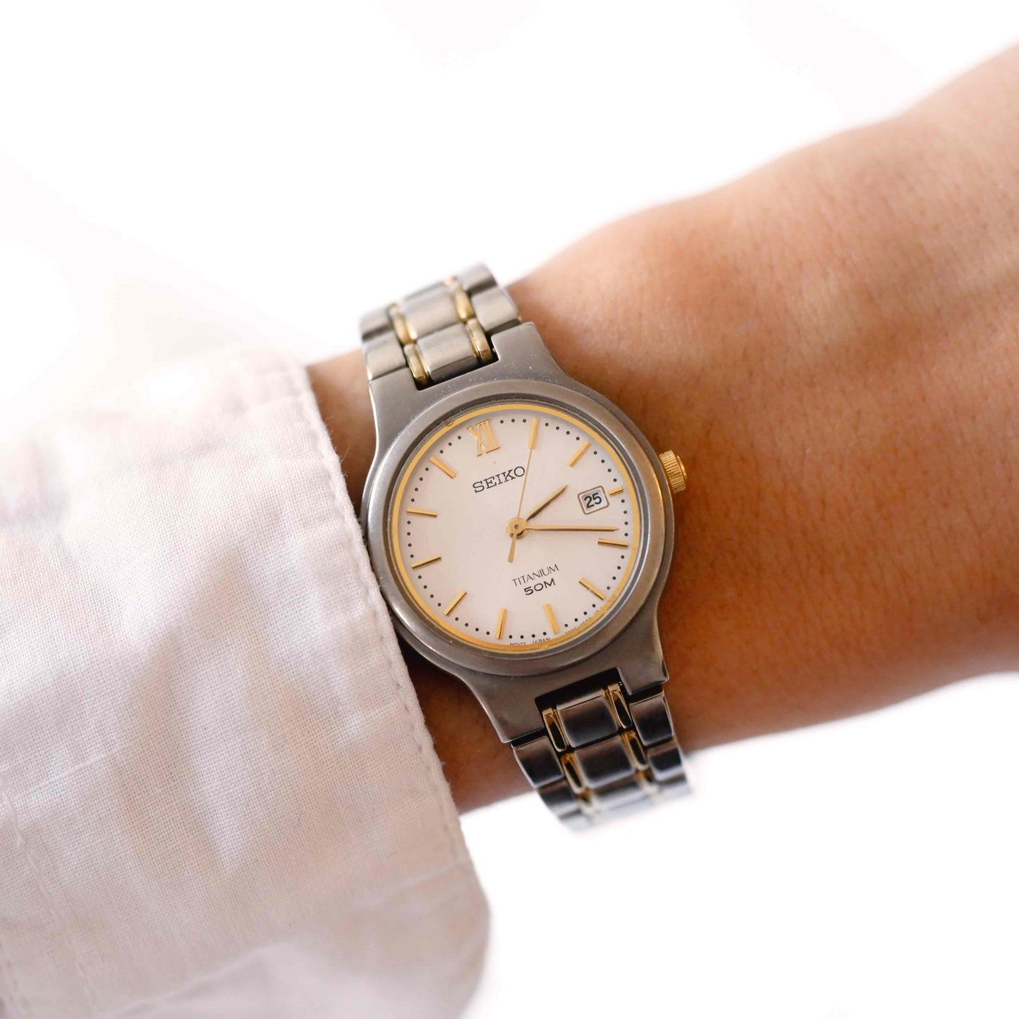 Seiko Vintage Watch: Ladies 90s Gold Titanium Diver with Classic Silver Dial