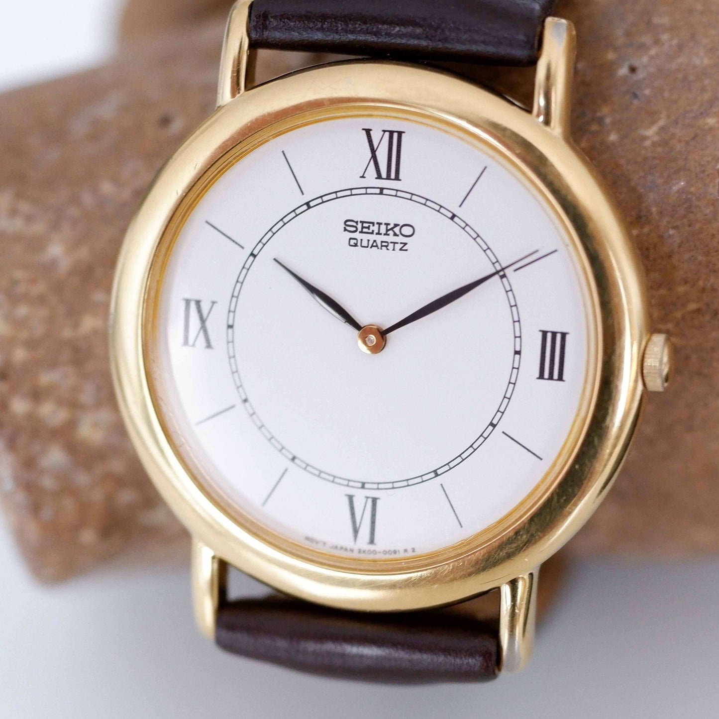 Seiko Vintage Ladies Watch: 90s Gold with Elegant Roman Numerals, Slight Right Side