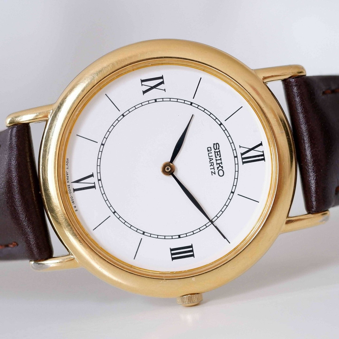 Seiko Vintage Ladies Watch: 90s Gold with Elegant Roman Numerals, Third Front Side