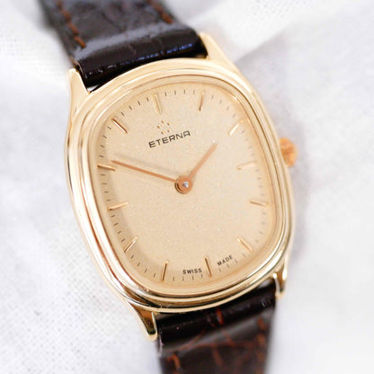 Eterna Vintage Watch: Ladies 90s Gold with Sparkling Champagne Dial - New Old Stock