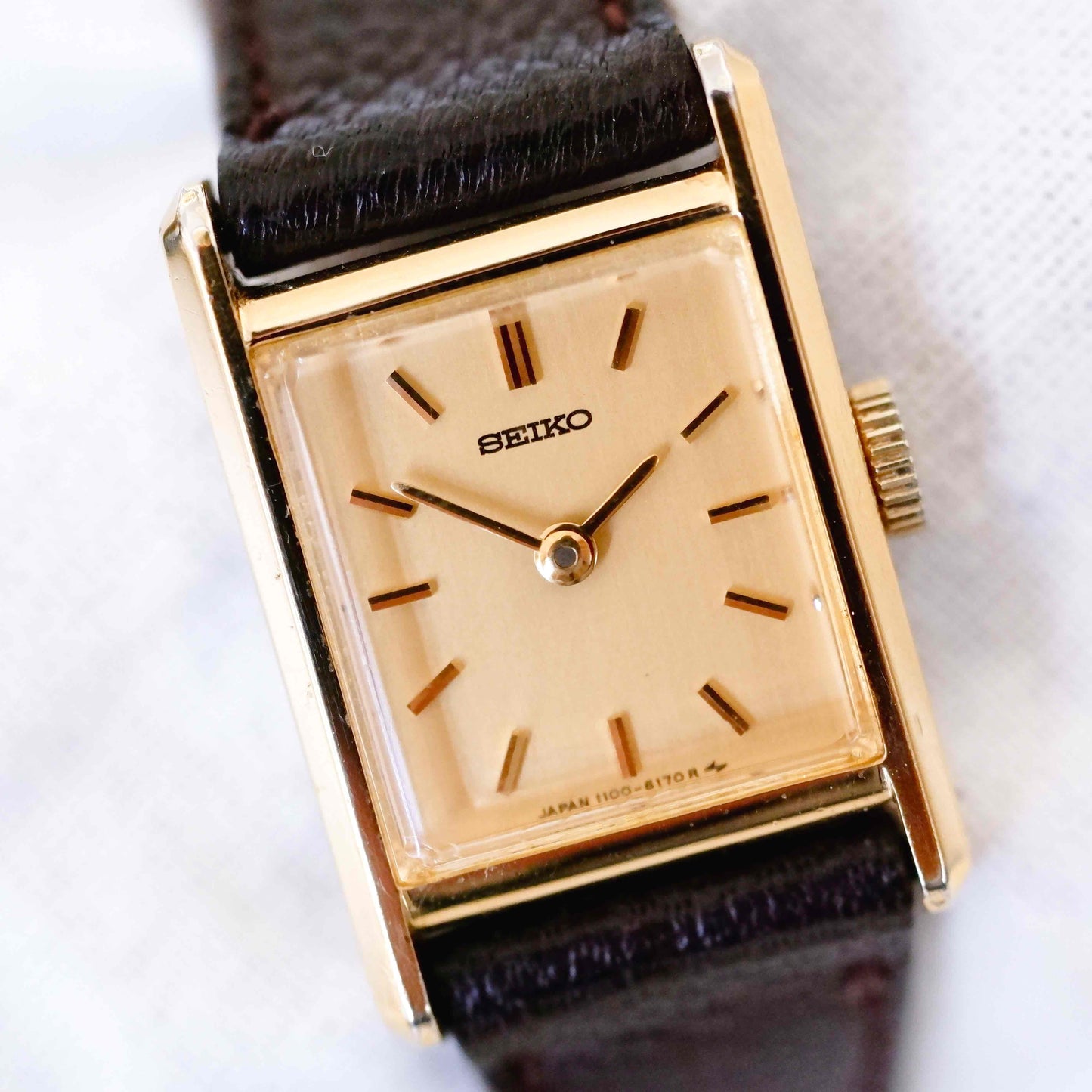 Seiko Vintage Watch: Ladies 80s Mechanical, Golden Rectangular with Champagne Dial NOS