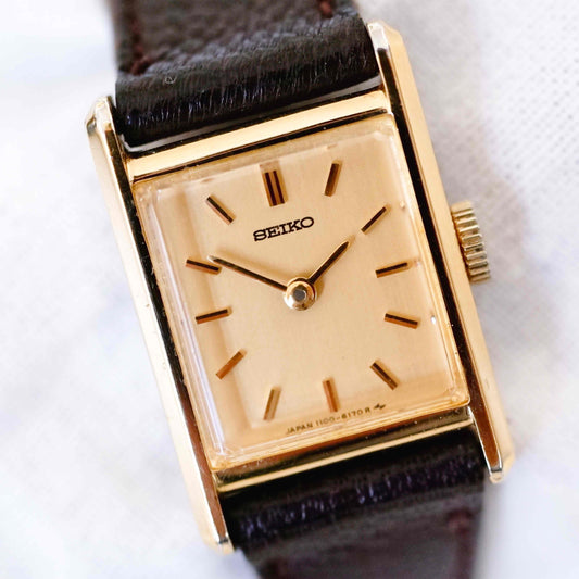 Seiko Vintage Watch: Ladies 80s Mechanical, Golden Rectangular with Champagne Dial NOS