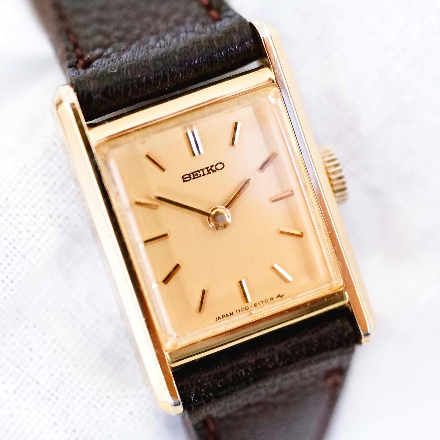 Seiko Vintage Watch: Ladies 80s Mechanical, Golden Rectangular with Champagne Dial NOS