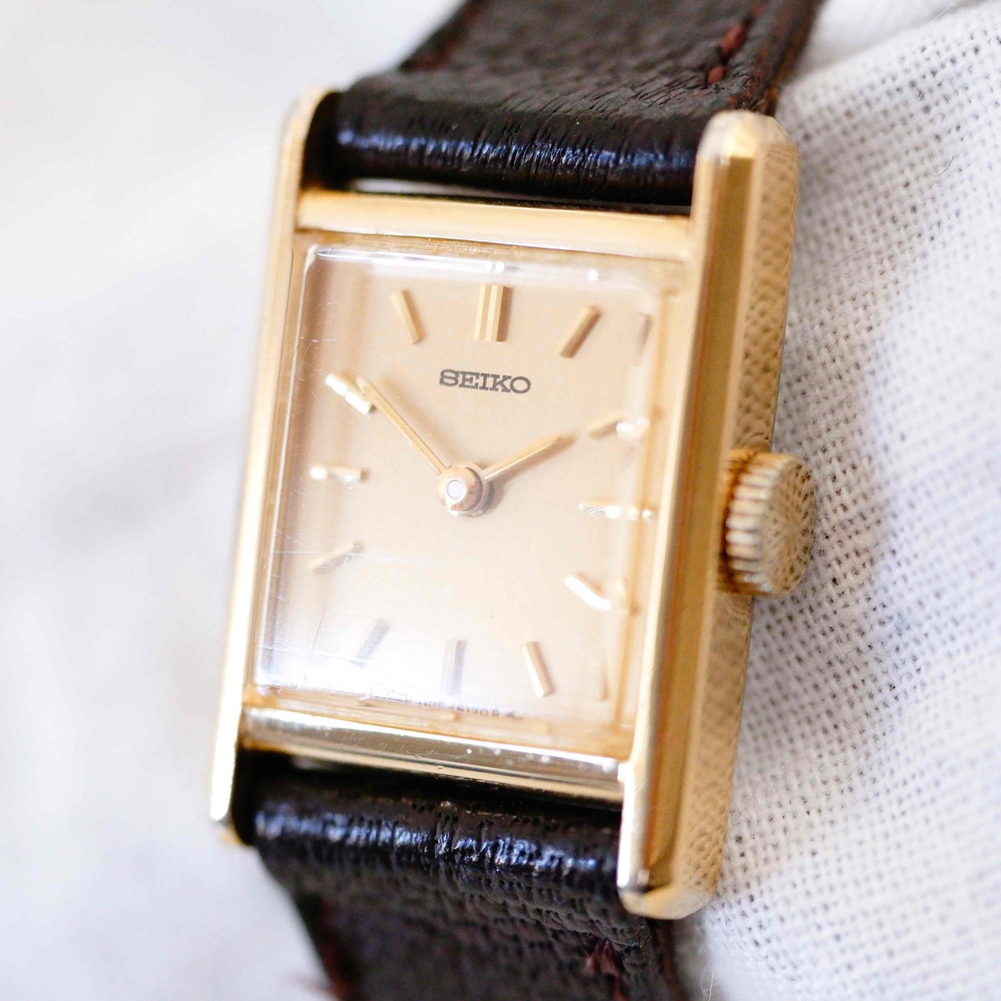 Seiko Vintage Watch: Ladies 80s Mechanical, Golden Rectangular with Champagne Dial NOS