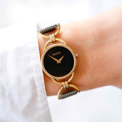 Gucci 6000.2.l Watch: Vintage Ladies 90s Gold and Tropical Black Dial