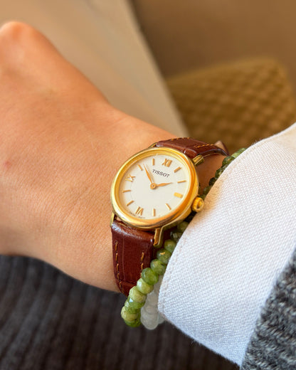 Tissot Vintage Watch: Ladies 90s Golden Iconic with White Roman Dial