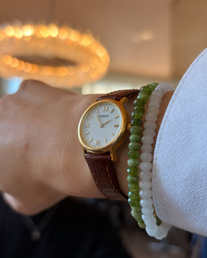 Tissot Vintage Watch: Ladies 90s Golden Iconic with White Roman Dial