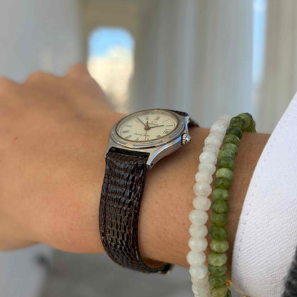 Eterna Royal Quartz: Ladies Watch 80s Gold with White Roman Dial