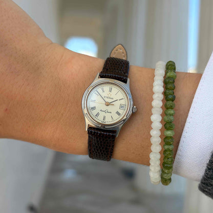 Eterna Royal Quartz: Ladies Watch 80s Gold with White Roman Dial