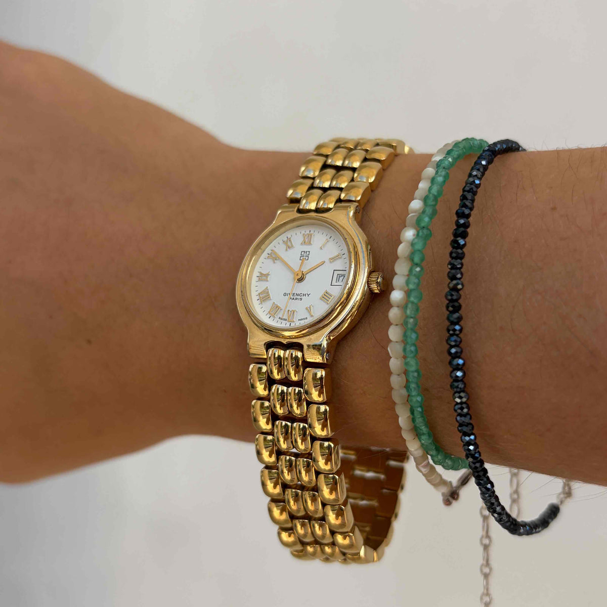 Givenchy Cocktail: Vintage Ladies 90s Gold White Dial with Roman Numerals