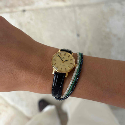 Omega Geneve Dainty: Ladies 70s Hand-Wound Sunburst Champagne Dial