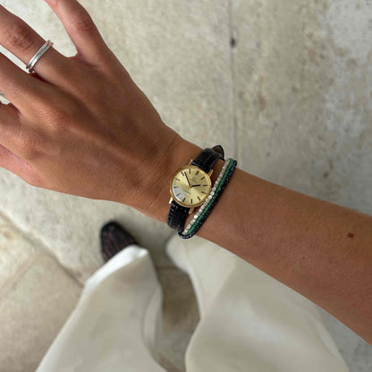 Omega Geneve Dainty: Ladies 70s Hand-Wound Sunburst Champagne Dial