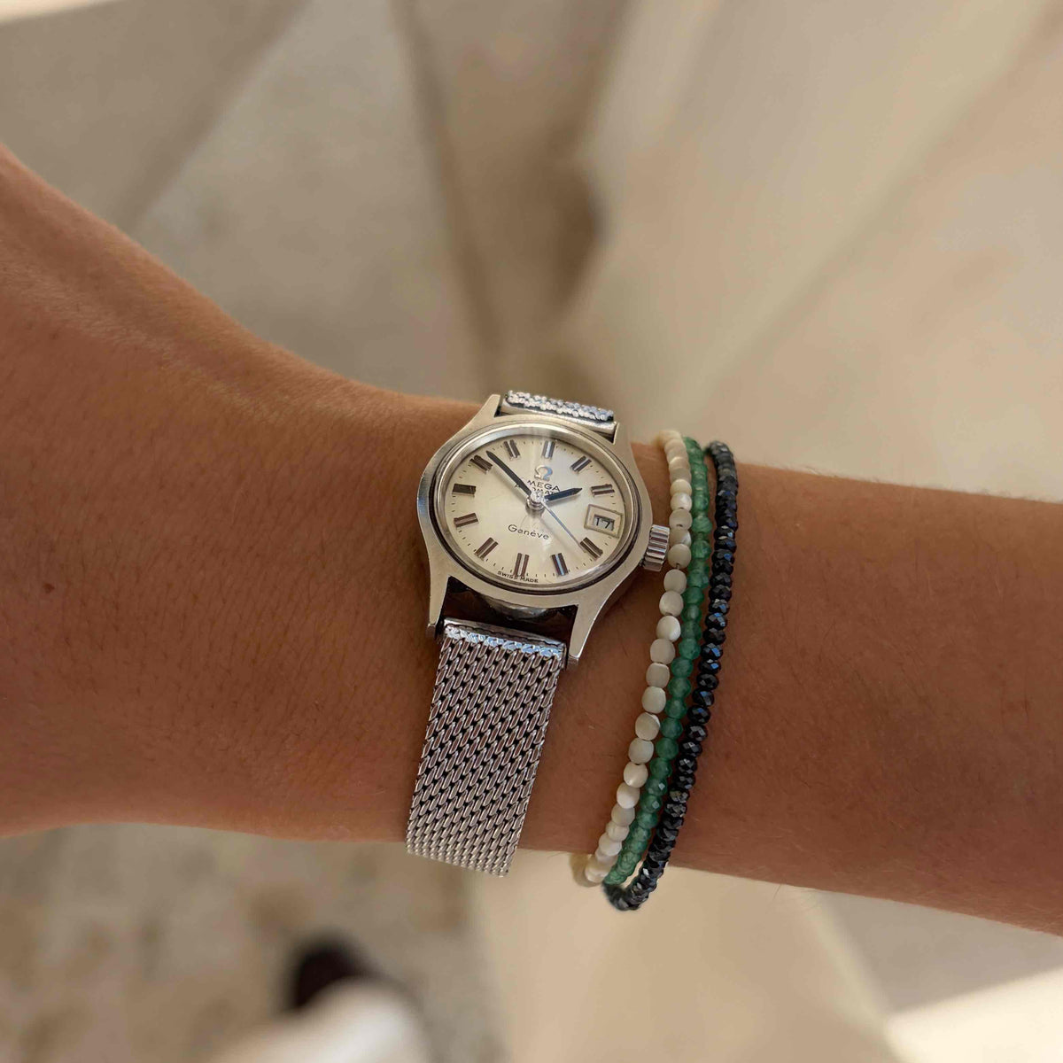 Omega Geneve Dainty: Ladies 70s Silver Automatic Sunburst Dial with Box
