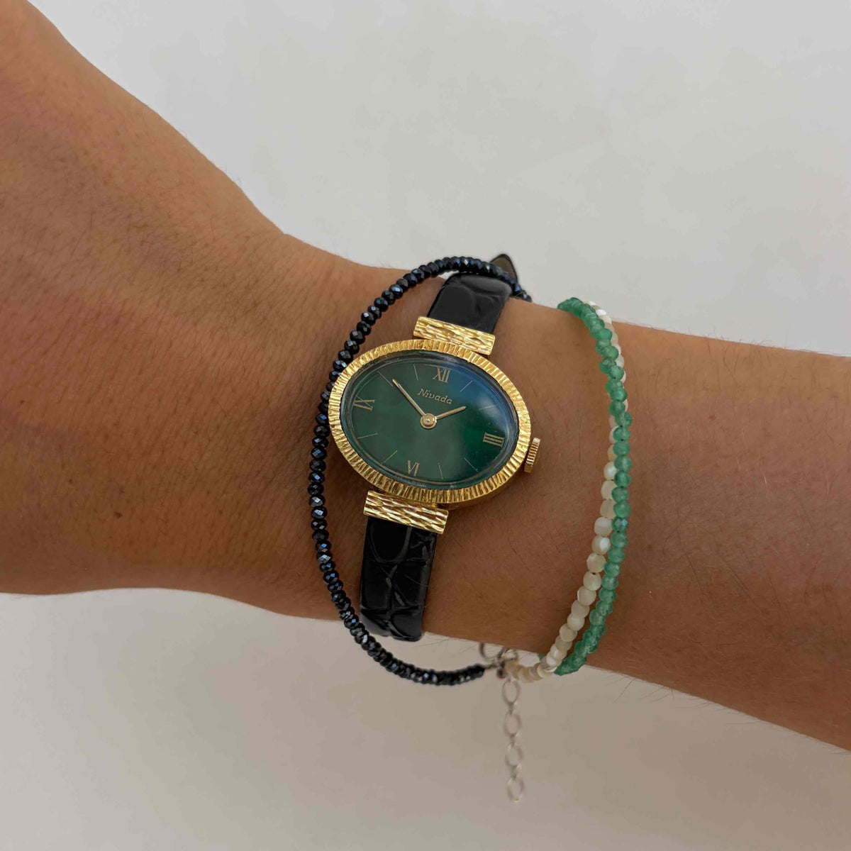 Nivada Dainty Watch: Ladies 70s Golden Emerald Dial Mechanical
