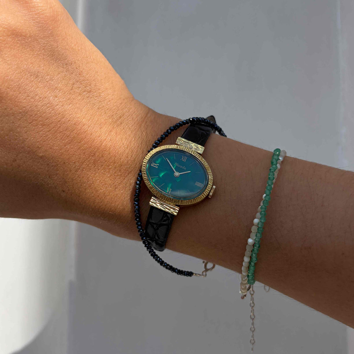 Nivada Dainty Watch: Ladies 70s Golden Emerald Dial Mechanical