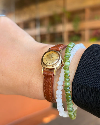 Tissot Cocktail Watch: Dainty Ladies 50s Mechanical Icon with Golden Dial