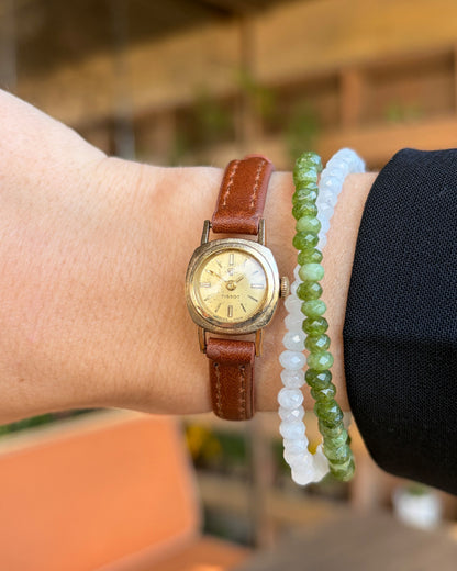 Tissot Cocktail Watch: Dainty Ladies 50s Mechanical Icon with Golden Dial