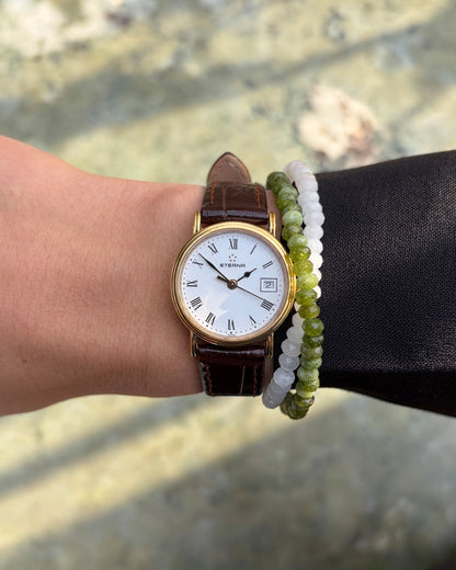 Eterna Vintage Watch: Ladies 90s Gold with White Roman Dial