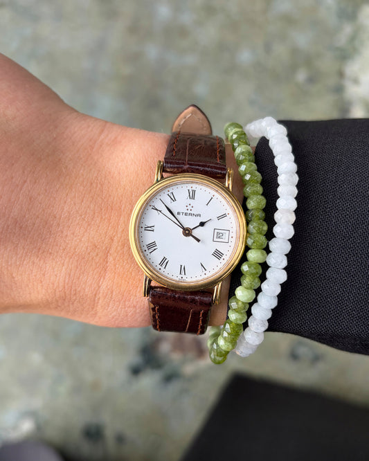 Eterna Vintage Watch: Ladies 90s Gold with White Roman Dial