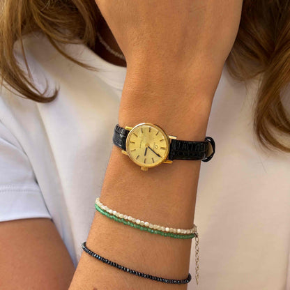 Omega Geneve Dainty: Ladies 70s Hand-Wound Sunburst Champagne Dial