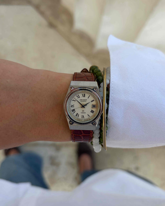 Orient Vintage Watch: Ladies Silver 80s White Roman Dial Leather Strap