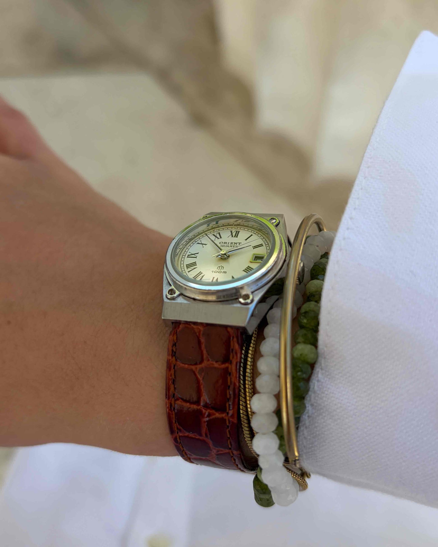 Orient Vintage Watch: Ladies Silver 80s White Roman Dial Leather Strap