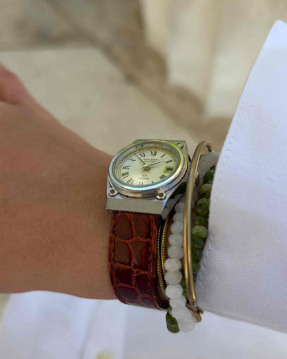 Orient Vintage Watch: Ladies Silver 80s White Roman Dial Leather Strap