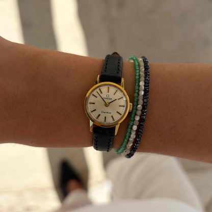 Omega Geneve Dainty: Ladies 70s Hand-Wound Sunburst White Dial