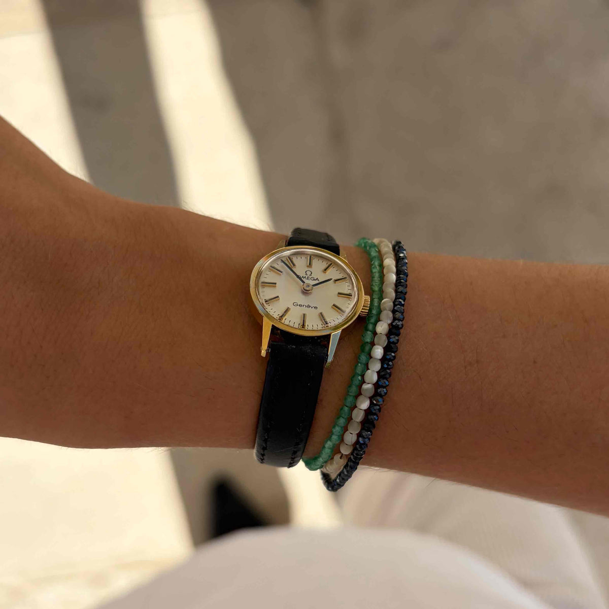 Omega Geneve Dainty: Ladies 70s Hand-Wound Sunburst White Dial