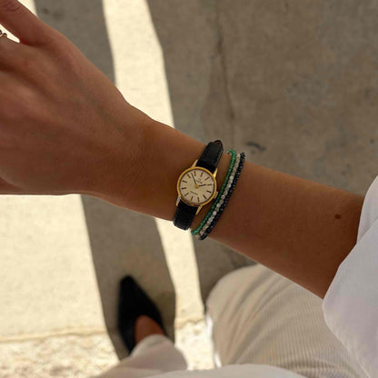 Omega Geneve Dainty: Ladies 70s Hand-Wound Sunburst White Dial