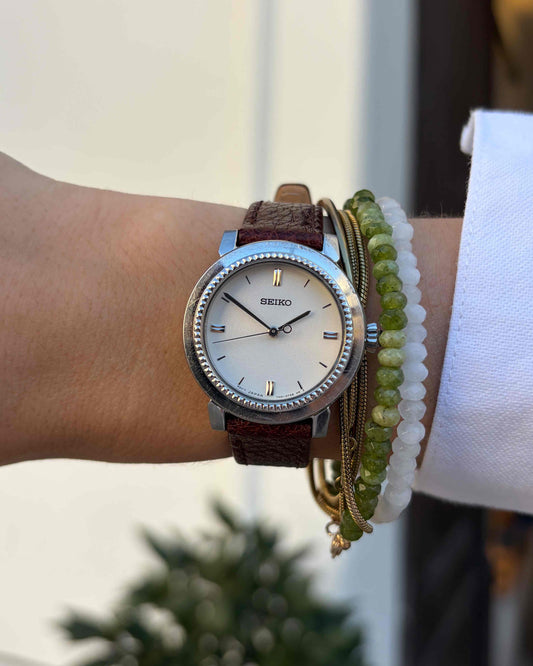 Seiko Vintage Watch: Ladies Silver 80s Sunburst White Dial