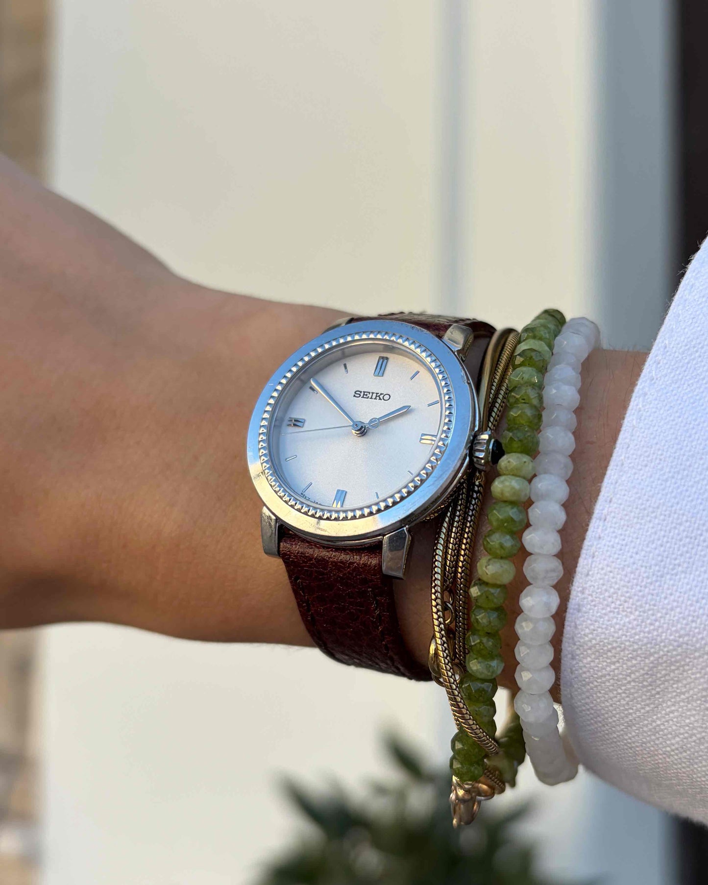 Seiko Vintage Watch: Ladies Silver 80s Sunburst White Dial