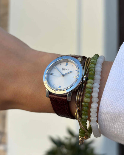 Seiko Vintage Watch: Ladies Silver 80s Sunburst White Dial
